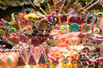 Fototapeta na wymiar Traditional handmade sweets displayed in shop. Souvenirs. Gumballs, gummy bears, candy.