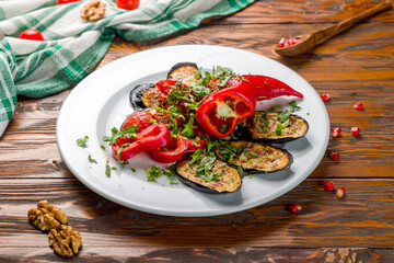 grilled vegetables on a plate on wooden table