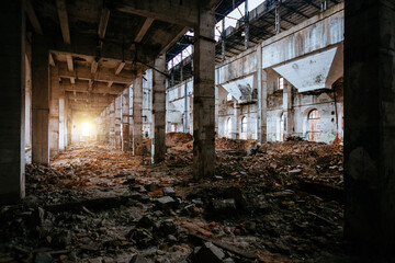 Fototapeta na wymiar Old abandoned large industrial hall waiting for demolition