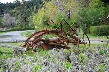 Abandoned rusty farm equipment