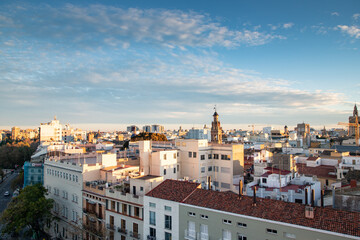 Fototapeta na wymiar VALENCIA , SPAIN - DECEMBER 6, 2021: aerial cityscape view from Serranos towers on the old town of Valencia city in Spain