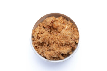 dried shredded pork in a white ceramic cup