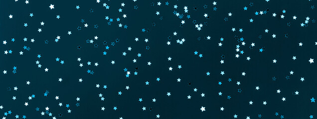 Banner of Festive blue green background with many many silver stars. Christmas, New Year or Birthday theme concept. An ideal backdrop for your banner or web design. Backplate for happy holidays