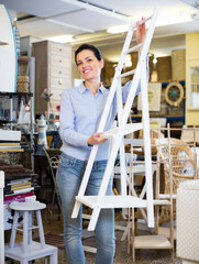 .Woman looking for interior items at the local interior store