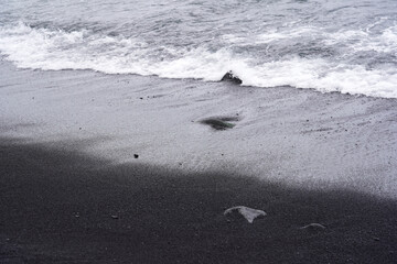 The black sand beach in Big Island, Hawaii