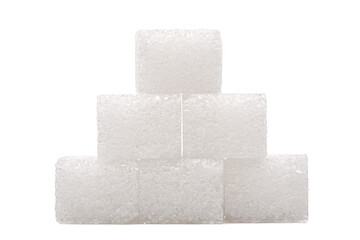 Sugar cubes on one another, isolated on white background.