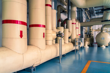 Modern boiler room equipment for heating system. Pipelines, water pump, valves, manometers.