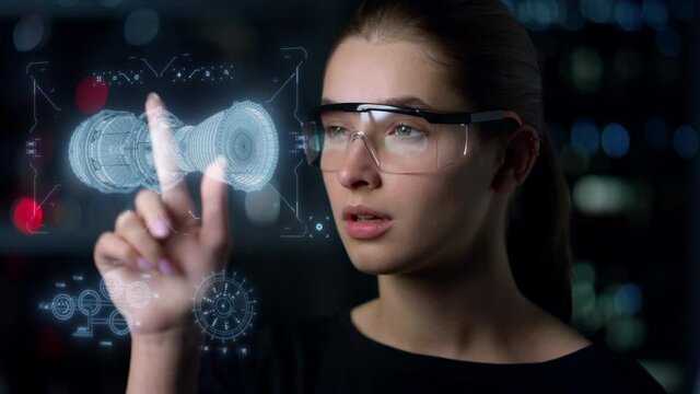 Engine hologram inspection woman analysing holographic image in digital glasses