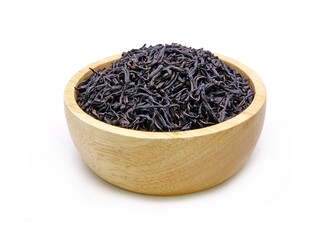 Earl Grey tea in wooden bowl isolated on white background