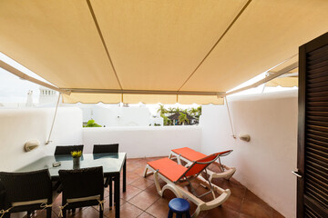 Small table on a beautiful terrace or balcony