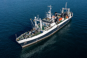 Fishing sea trawler at sea.