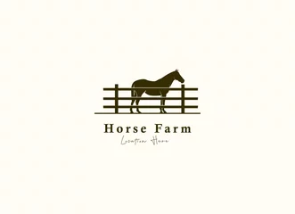 Foto op Plexiglas Horse silhouette behind wooden fence paddock for vintage retro rustic countryside western country farm ranch logo design © Alvins Creative