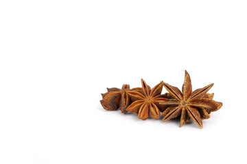 Star anise spice close-up on white background.