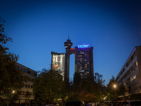 BELGRADE, SERBIA - JULY 16, 2018: Selective blur on Western Gate, called Zapadna Kapija, or Zepter Genex Tower, at night. It's a business and residential skyscraper, symbol of brutalist architecture
