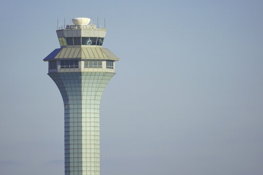 Air traffic control tower at Chicago O'Hare International Airport with copy space on the right.