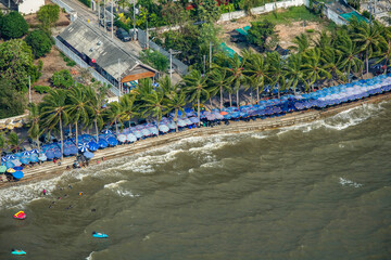 Crowded Holiday Tourist Beachs with Umbrellas Thailand