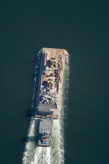 Transporting Bolders by Barge Olympia Washington USA
