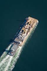 Transporting Bolders by Barge Olympia Washington USA