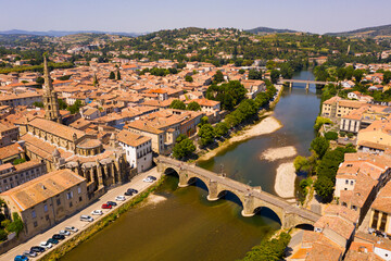 Naklejka premium Picturesque drone view of Limoux summer cityscape looking out over ghotic cathedral on bank of river Aude , France.