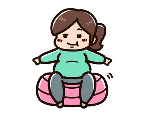 バランスボールに乗る肥満の女性