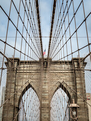 View of the Brooklyn Bridge in New York City on a sunny day