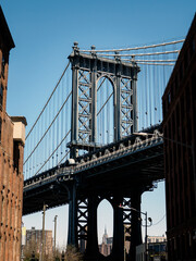 Manhattan bridge on a sunny day viewed from Brooklyn