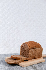 Choco bread loaf slice on a white background. Chocolate flavor	
