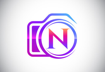 Initial N monogram letter with a camera icon. Logo for photography business, and company identity