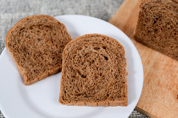 Choco bread loaf slice on a white background. Chocolate flavor	
