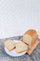 Wheat bread loaf on a white background.