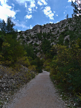 View Of Hiking Path With Diminishing Perspective In A Gorge Near Calanque D'En-Vau In Calanques National Park Near Cassis, French Riviera.