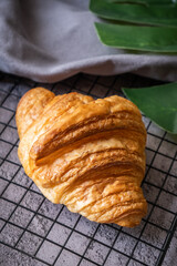 Croissant on baking rack