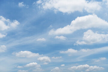 Beautiful clouds during spring time in a Sunny day. Blue sky and white fluffy clouds