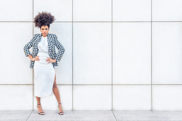 woman dress in formal clothes modeling staring at the camera