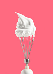 Whipped cream on the top of kitchen mixer. Process of making confectionery masterpiece. Sweet mood...