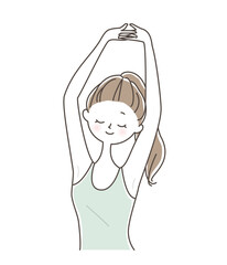 手を組んで上に上げ大きく伸びをする若い女性