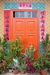 Fototapeta na wymiar Traditional Chinese House Door with Flowers