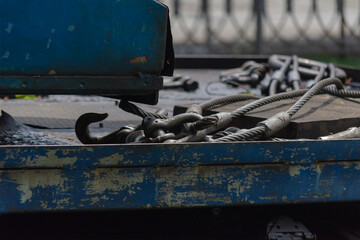 The slings lie on the open platform of the mobile crane. Mountin