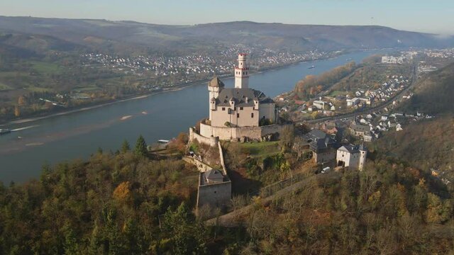 Aerial point of interest, Marksburg Castle on hill. Rhine River in background