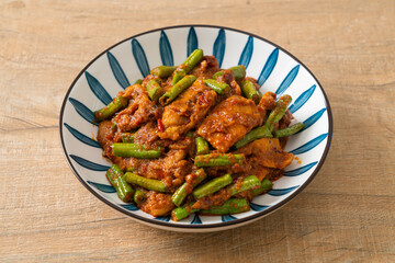 Stir fried pork with red curry paste