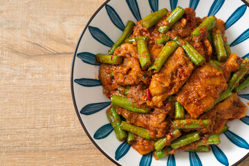 Stir fried pork with red curry paste