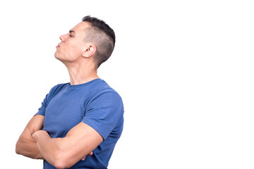 Man turning around with crossed arms and offended expression