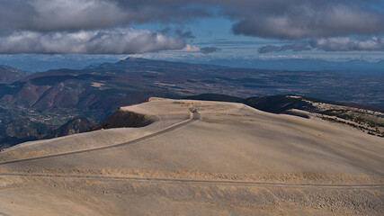 Panoramic view of the bare peak of Mont Ventoux, popular for cycling and skiing, with white...