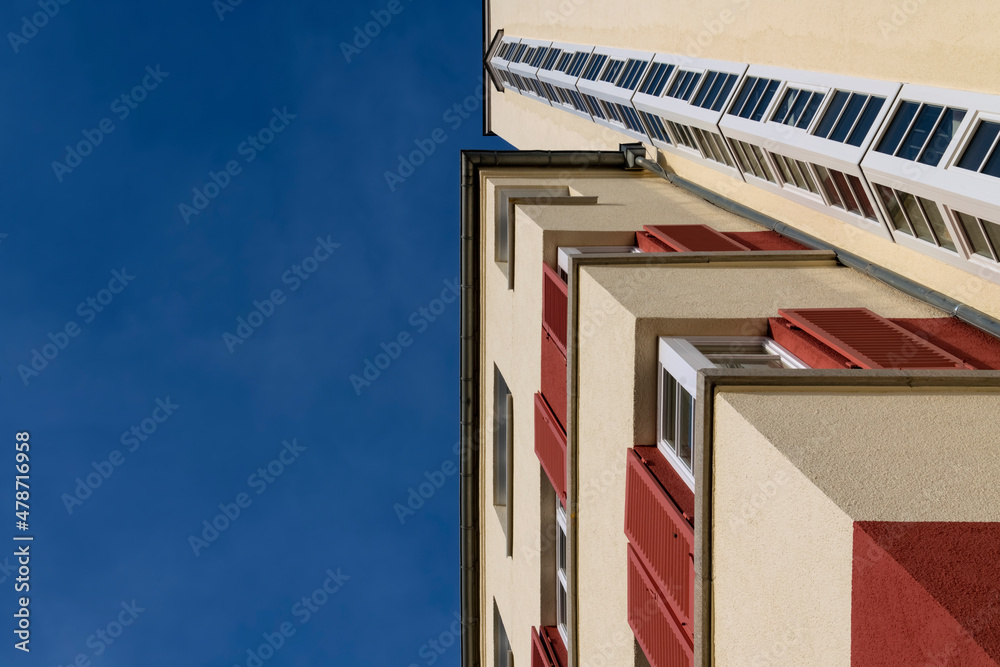 Wall mural Housing estate or Block of flats with white facade and symmetrial architecture in Stuttgart germany on a blue sky winter day. Urban building from the modern movement era or international style.