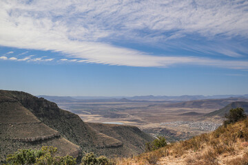 sky and mountain scenery viewed from above graaf reinet and the road to the valley of desolation viewpoint