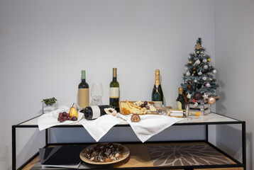 Various types of wine and cheese displayed on a table