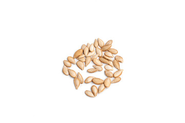 Pumpkin seeds isolated on a white background.