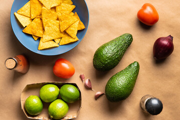 ingredients for cooking guacamole snacks top view on the background of craft paper top view. flatlay