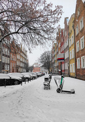 Beautiful snow-covered street in Gdansk in cold winter
