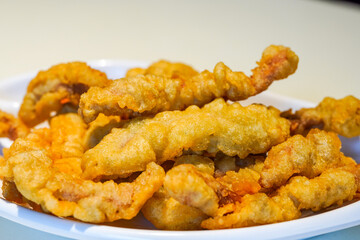 Close-up of a plate of delicious little crispy meat